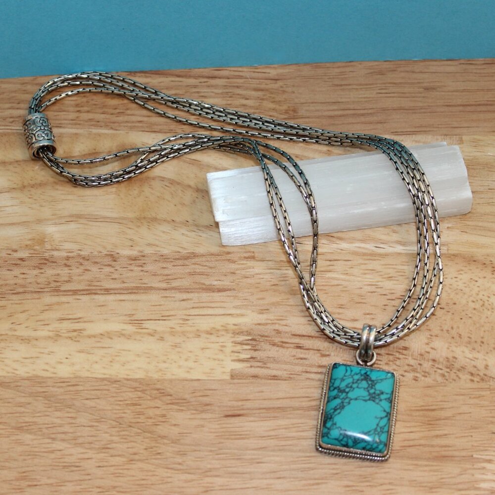 Silver Toned Multi Strand Turquoise Colored Pendant Necklace